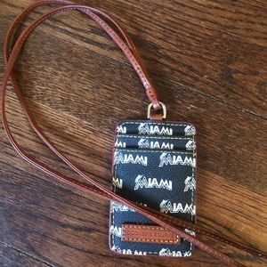 Dooney and Bourke Lanyard ID badge Wallet. 

Black